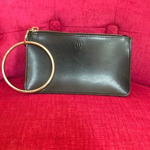 New O-Venture black leather wristlet